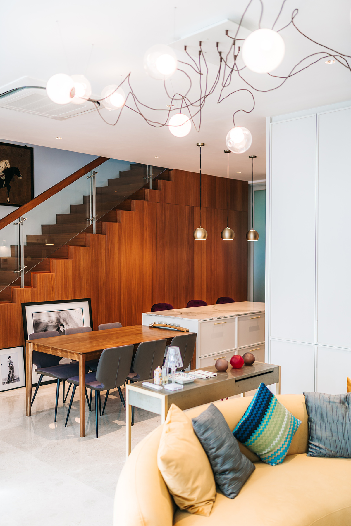 Detail of the low fluted timber panels used for shoe storage and seating