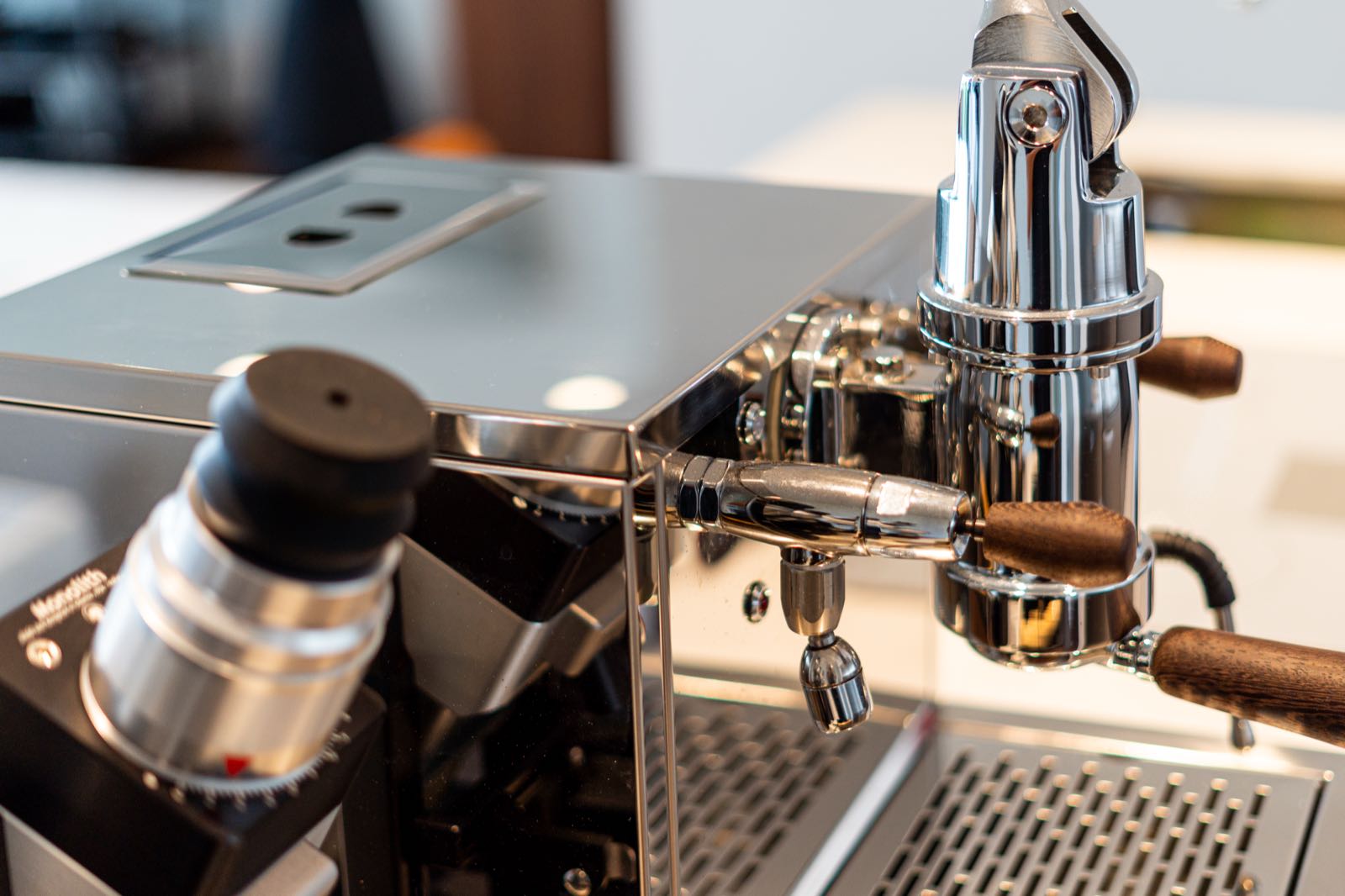 Detail of a Bezzera espresso machine with wooden portafilter handles