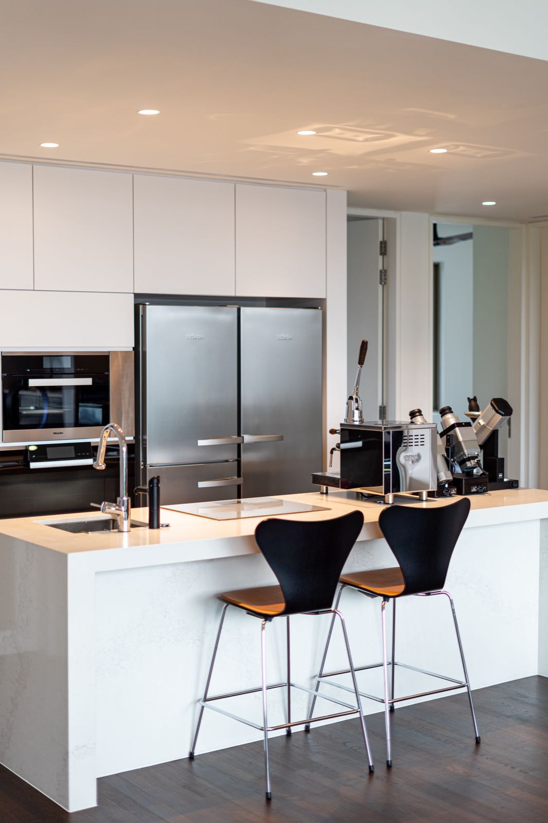 Kitchen island with double Miele fridge and integrated oven