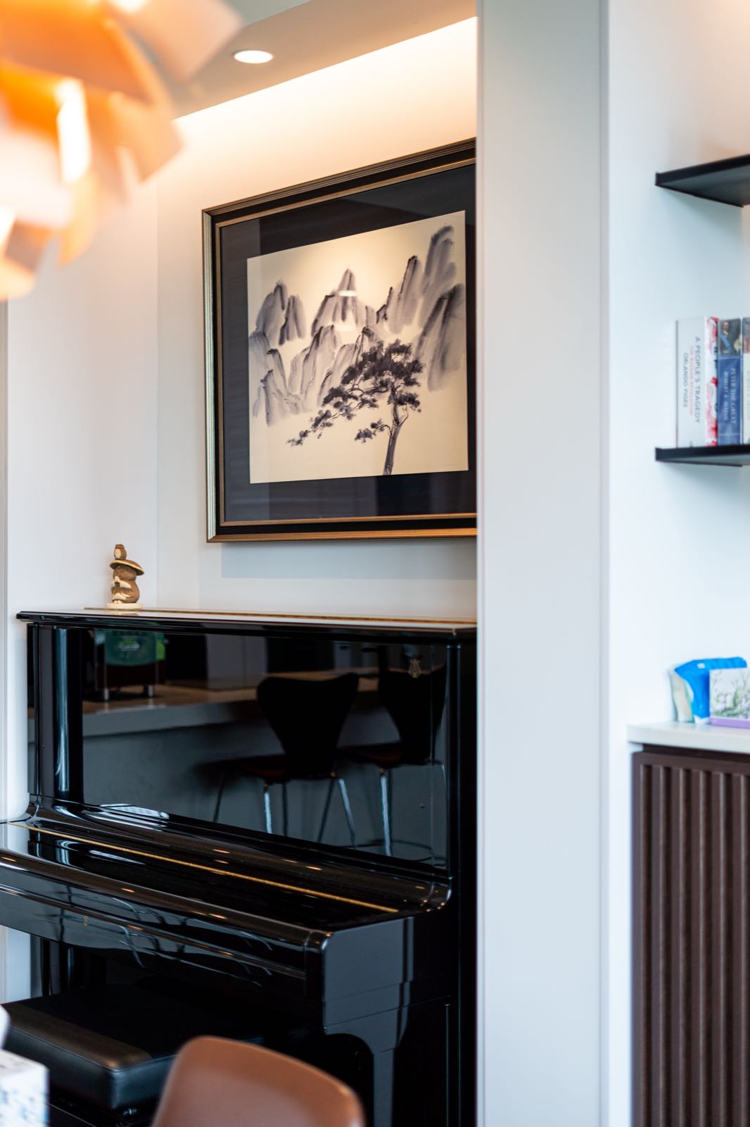 Steinway piano with framed Chinese ink painting above
