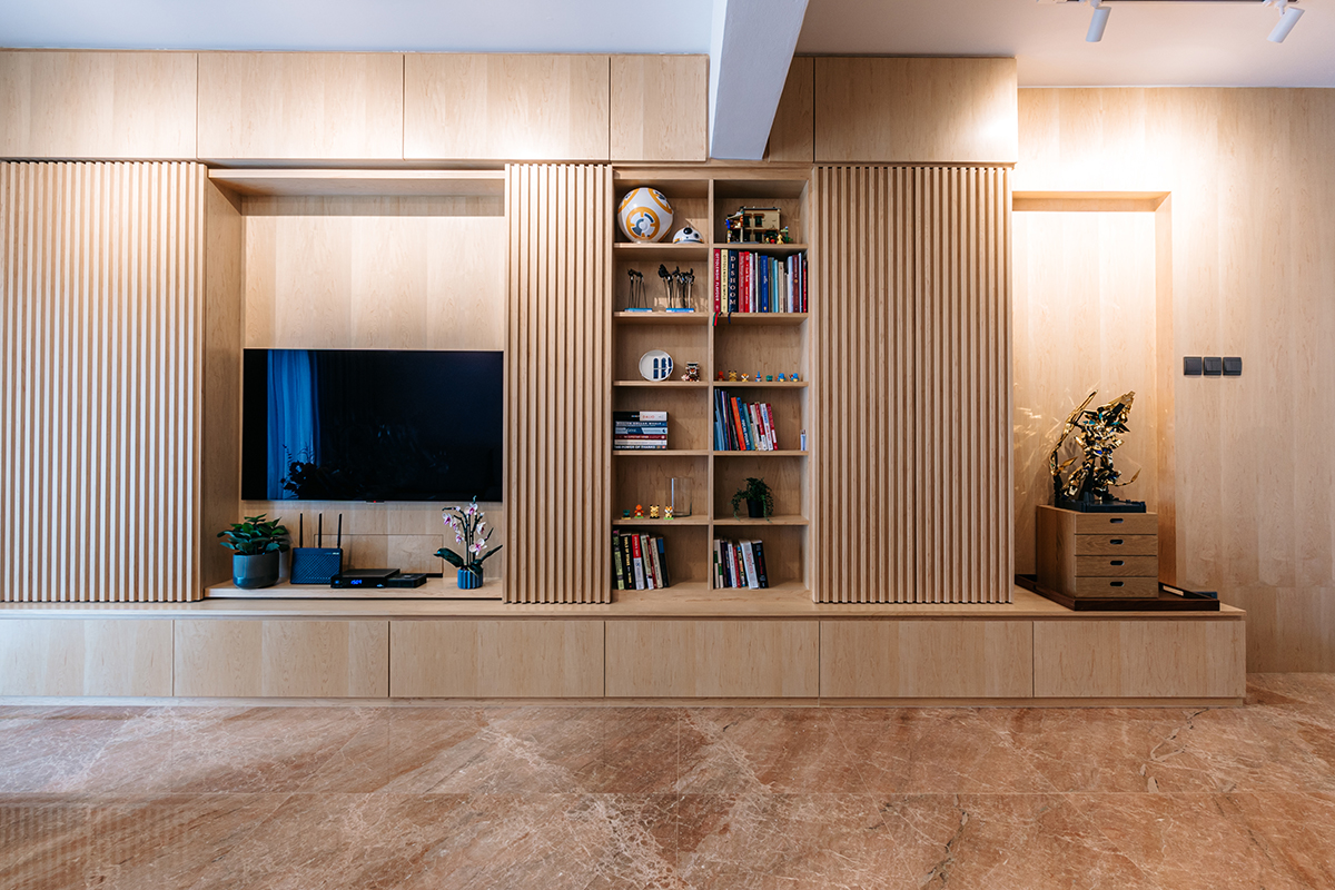 Dining area with timber joinery and a restrained neutral palette