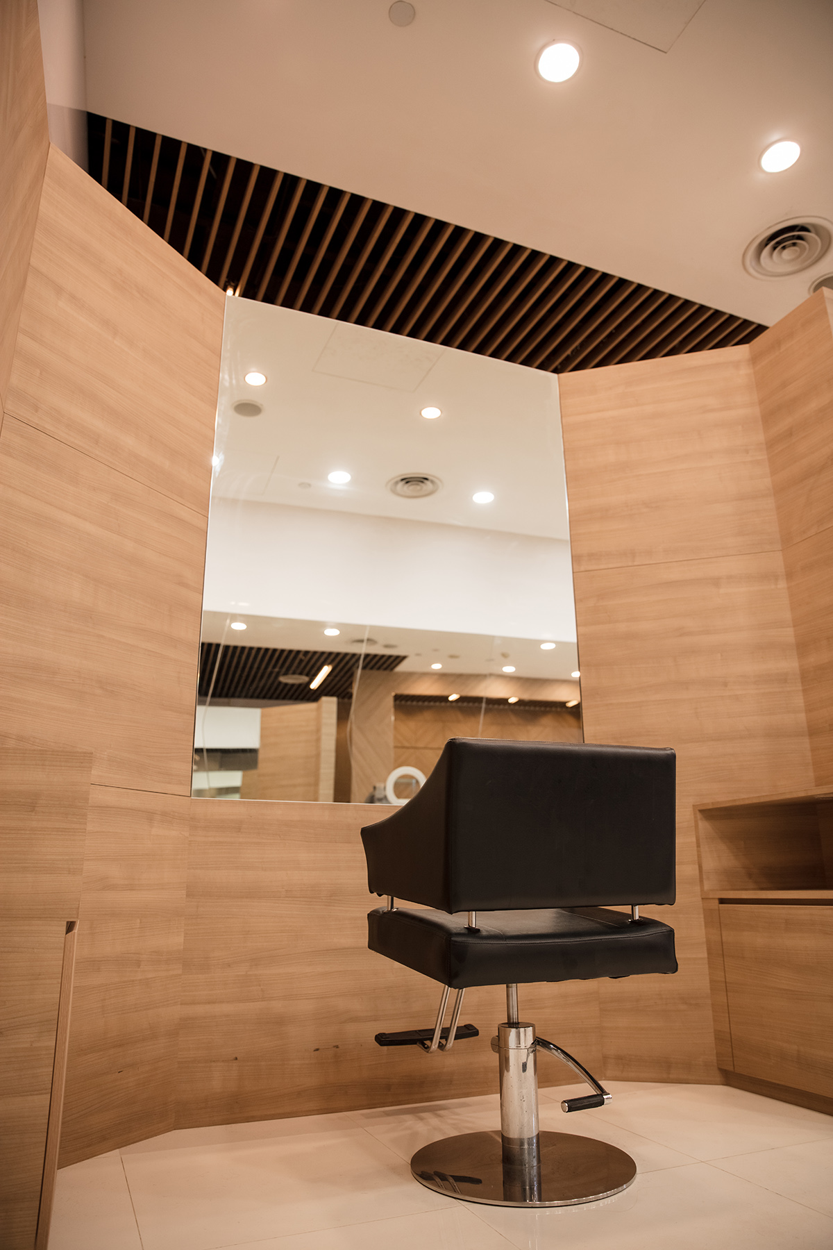 Detail of the drinks bar joinery and finishes at Kingsmen