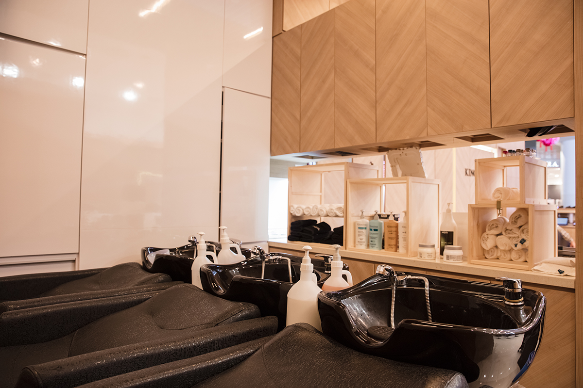 Drinks-serving bar counter inside the Kingsmen barber