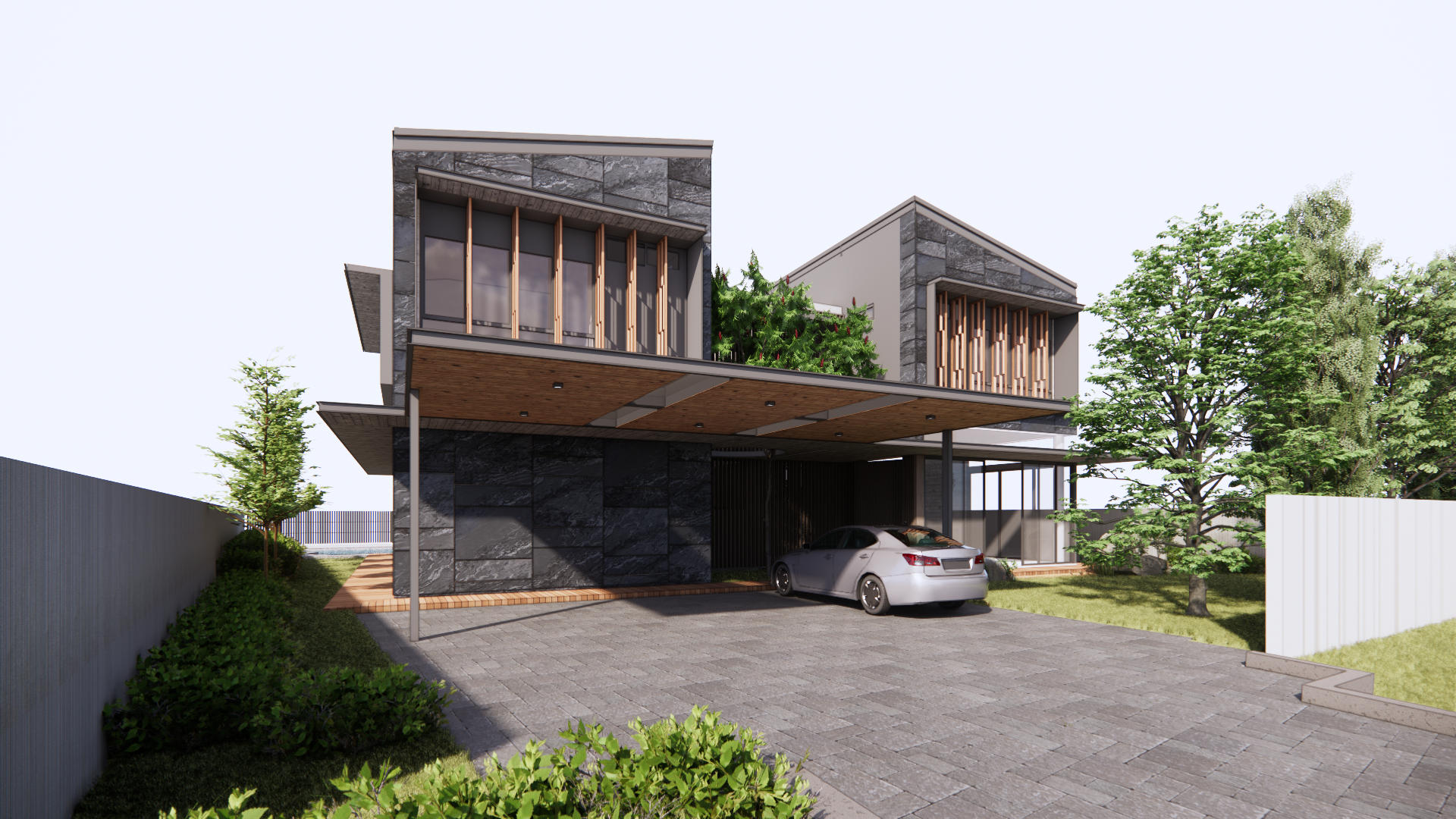 Front facade showing the two stone-clad volumes joined by a glazed central link
