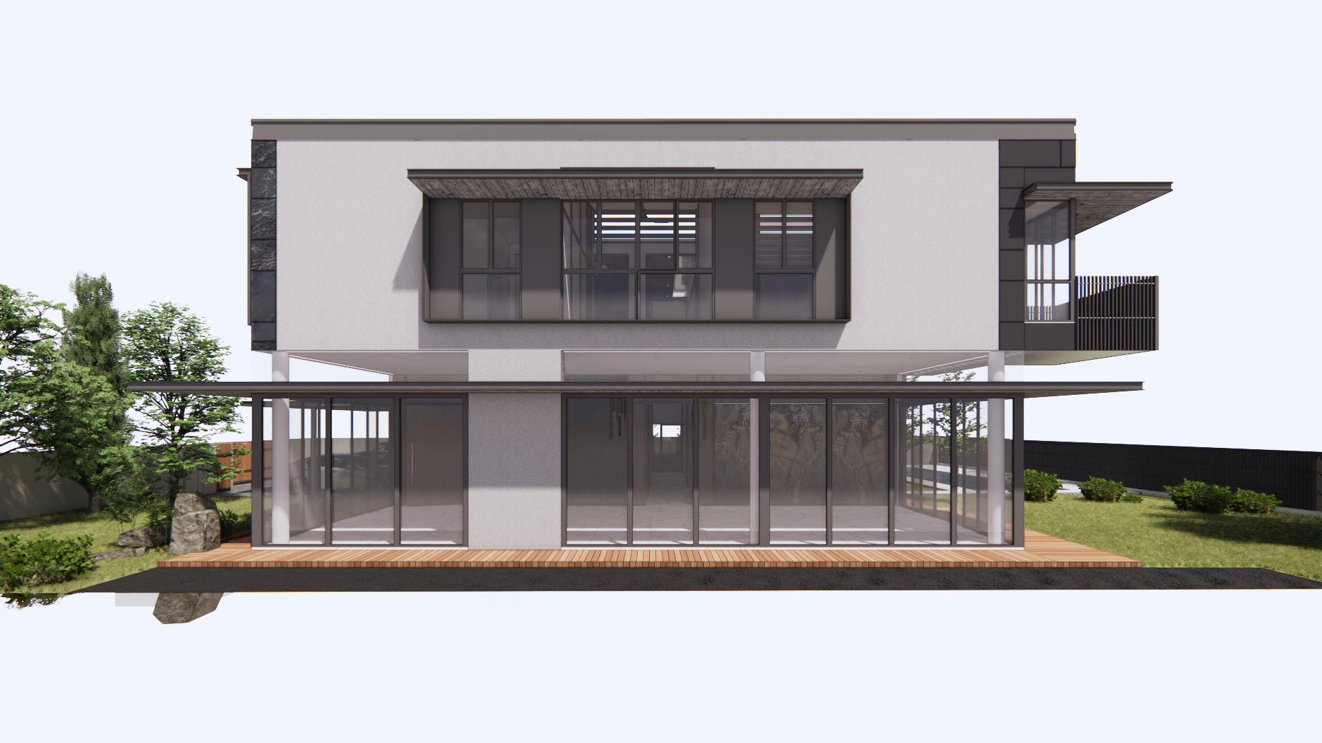Side elevation of the house with the pool terrace in the foreground