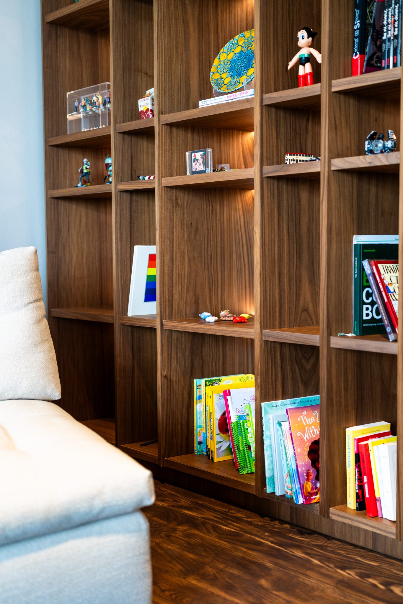 Family loft area with a soft curtain wall and a decorated tree in the corner